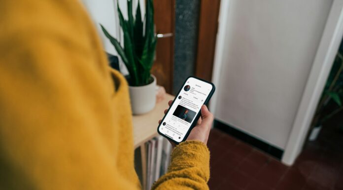 How to Share a Home Connection Without Slowing Work Apps looking-at-phone-screen-at-home