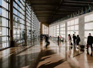 The Best eSIM Providers for Corporate Travellers travellers-in-airport-using-esim