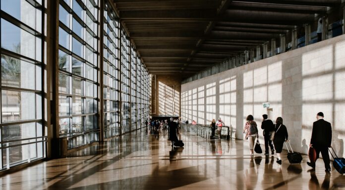 The Best eSIM Providers for Corporate Travellers travellers-in-airport-using-esim