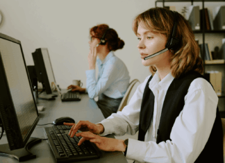 Experts Share: Cross-Border Challenges Of VoIP Compliance two-girls-working-in-office-with-headsets