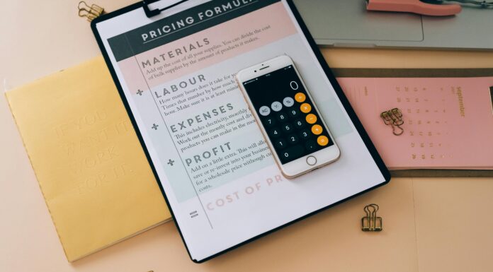 The Economics of VoIP desk-with-clipboard-pricing-formula-and-phone-calculator