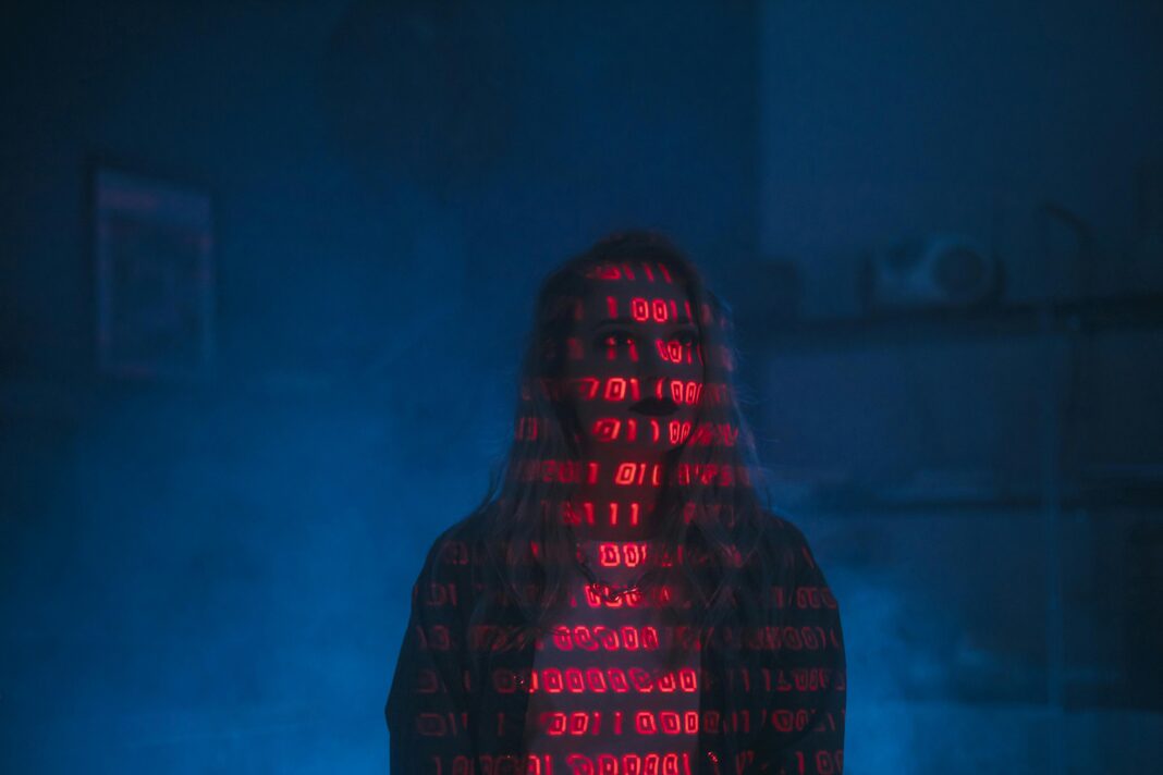 girl-standing-code-through-light