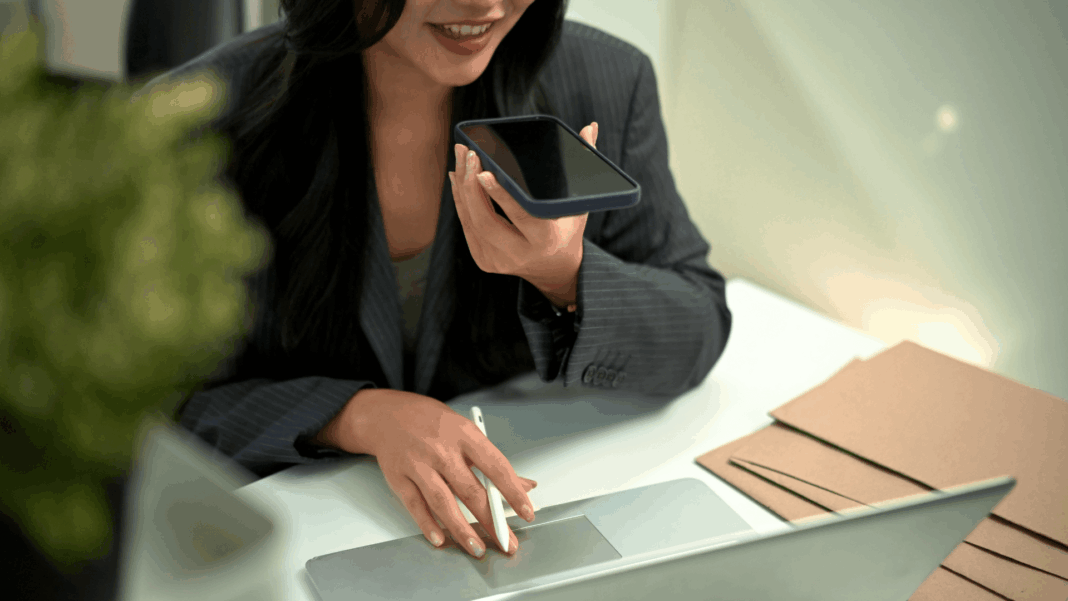VoIP-voice-activated-automation professional-woman-working-woman-phone-call-using-laptop