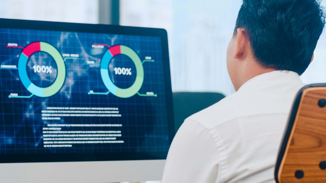 A professional reviewing VoIP system performance metrics a-professional-reviewing-VoIP-system-performance-metrics