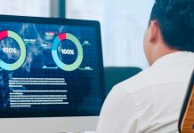 How Do You Monitor the Health of Your VoIP System? a-professional-reviewing-VoIP-system-performance-metrics