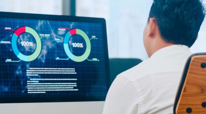 How Do You Monitor the Health of Your VoIP System? a-professional-reviewing-VoIP-system-performance-metrics